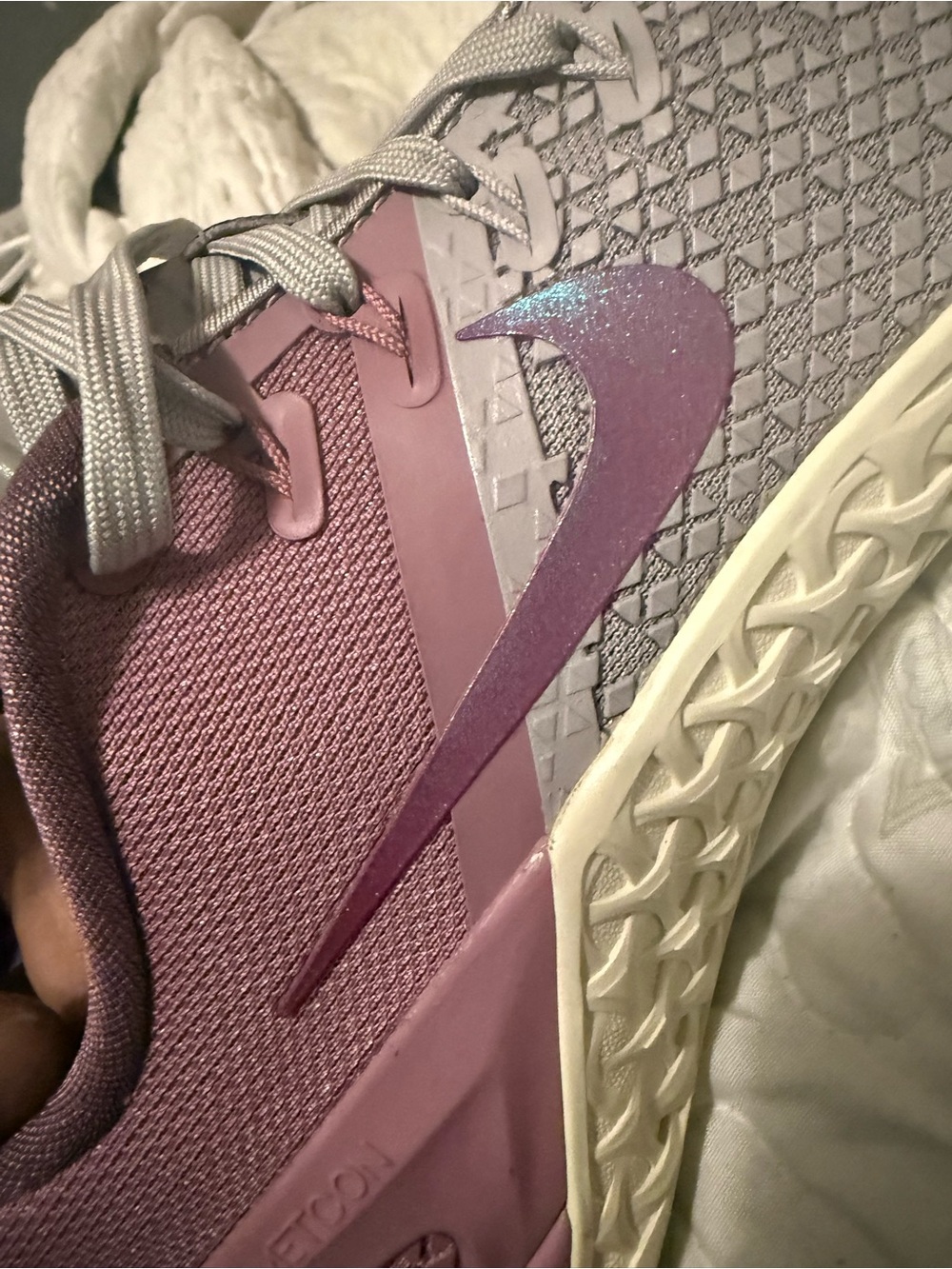 Nike Women's Running Shoe in Lavender Pink with Iridescent Swoosh